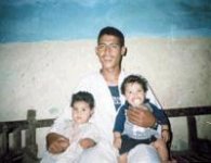 Dina and poss father & sibling.JPG